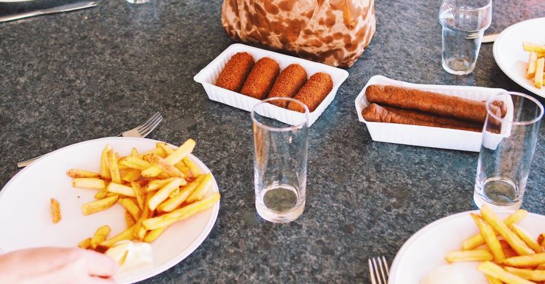 Food Aggression - Photography of French Fries and Hotdogs